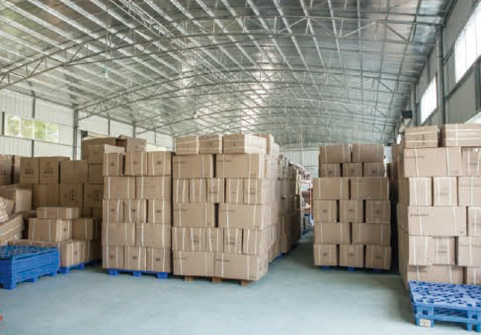 Cartons of finished FIGHTING orders stacked in the Foshan despatch warehouse