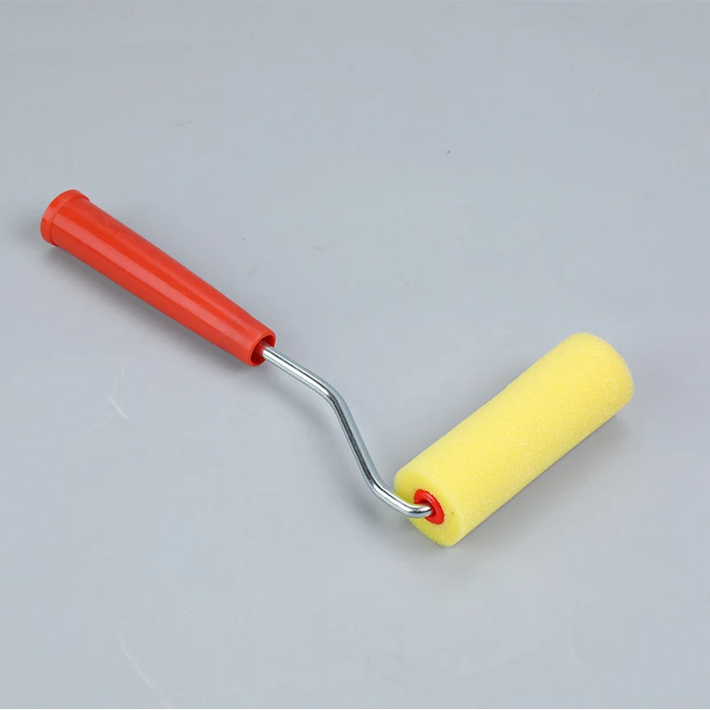 4 inch mini foam paint roller with yellow sleeve and orange plastic handle on bent metal frame