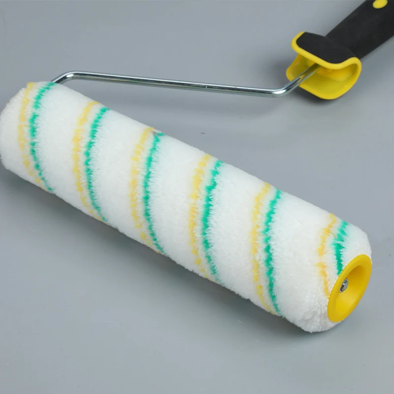 7 inch paint roller with white yellow and green striped cover and black handle