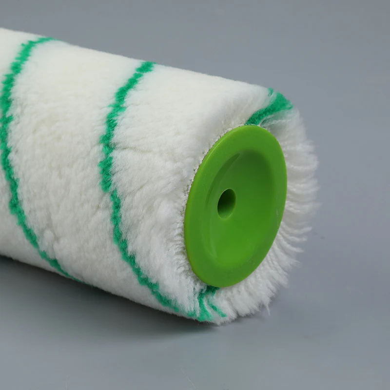 Close view of a 9 inch European roller cover with green spiral stripes and green end cap