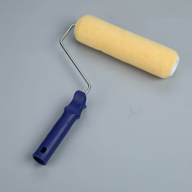 Paint roller with yellow fabric sleeve, metal frame, and blue plastic handle on a plain gray background