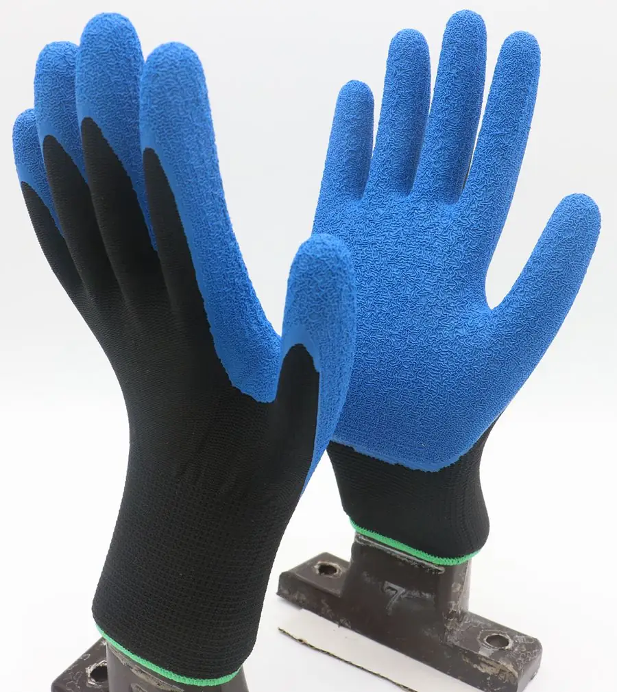 Blue crinkle coated work glove with black knitted liner and three quarter coverage
