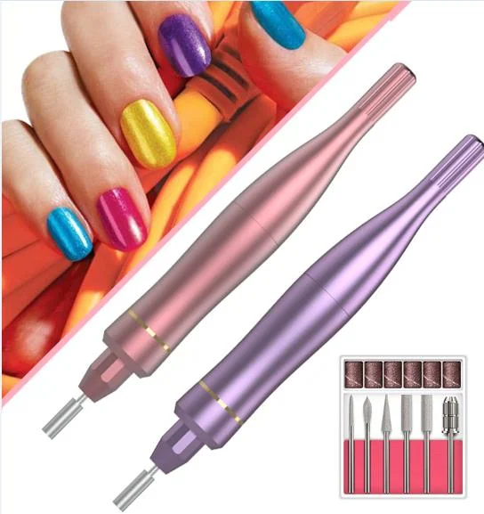 Electric nail drill machine with six metal bits in use on a fingernail