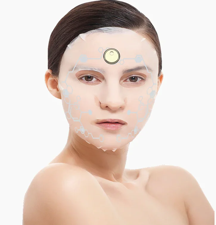 EMS facial toning device being applied to the cheek and jawline