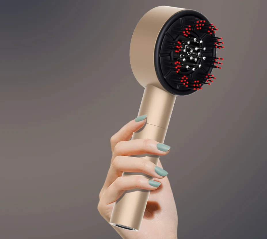 LED therapy hair comb in use on scalp with red light glowing