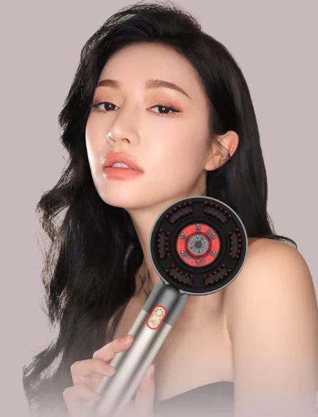 Side view of LED hair growth comb showing the bionic massage gears