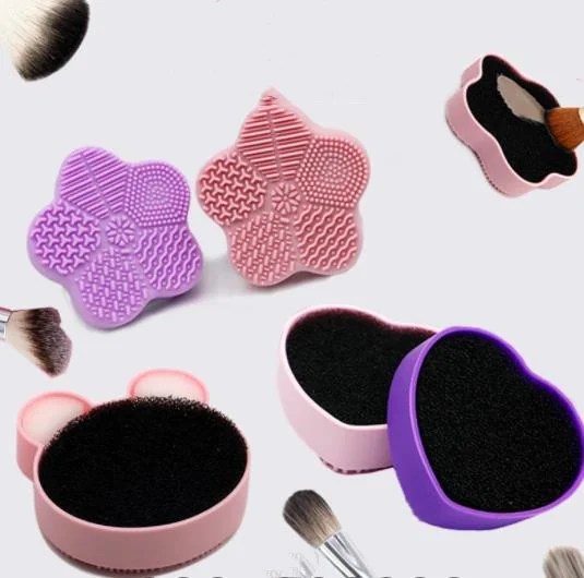 Flower-shaped silicone brush cleaning pad used to clean a makeup brush