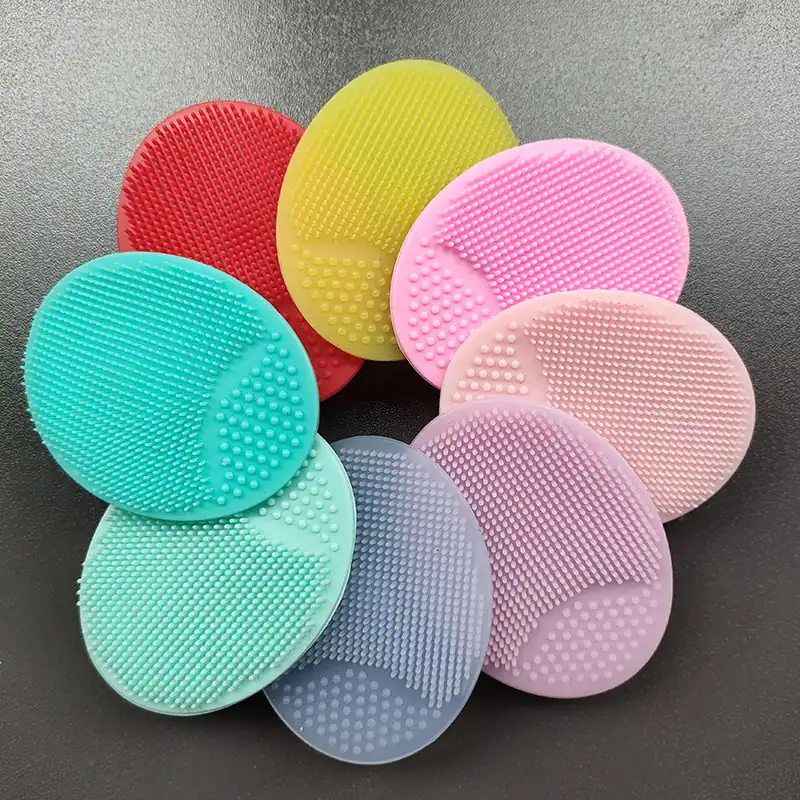 Silicone baby hair brush used to gently wash a baby's scalp