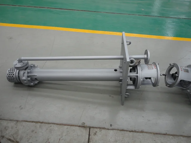 Long-column vertical sump pump laid out for inspection before assembly