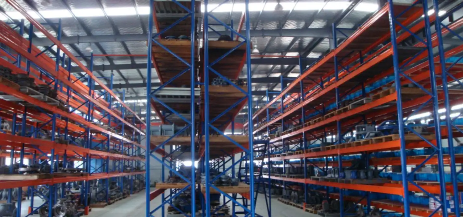 Multi-level pallet racking filled with pump components in the finished parts warehouse