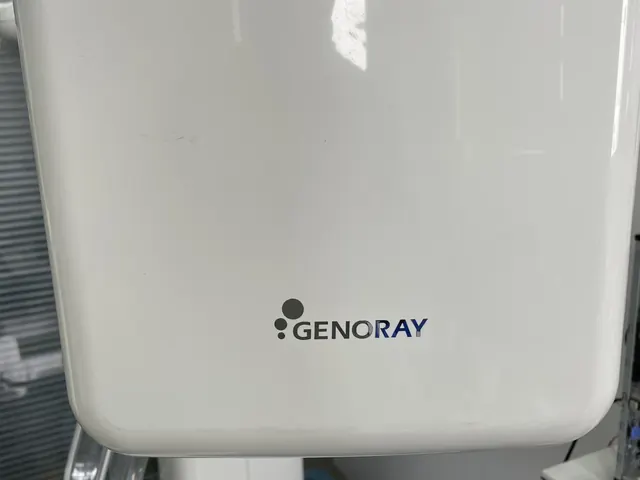 Genoray PAPAYA Plus detector housing with Genoray brand logo