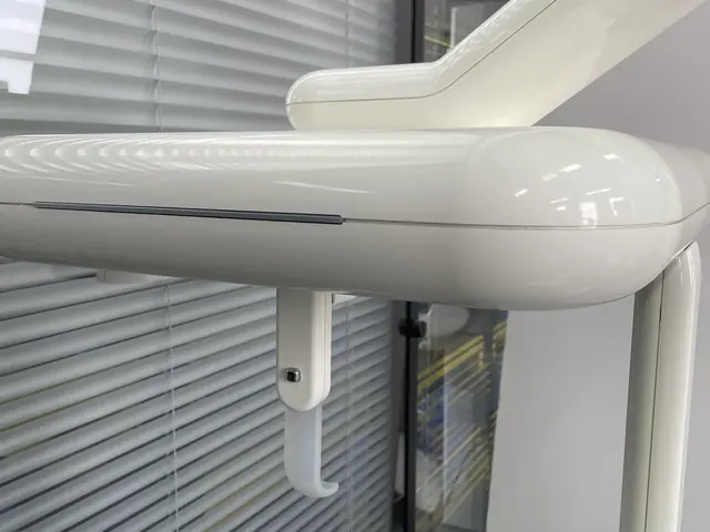 Genoray PAPAYA Plus rotating yoke and cephalometric arm intersection detail