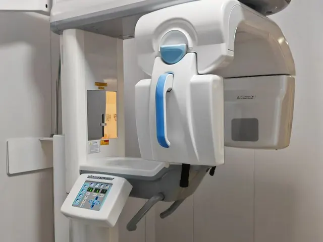 PointNix Point 800S HD 3D Plus CBCT close-up — main gantry detail showing blue handle, patient chin rest, and integrated control panel with Point 800S HD 3D Plus label