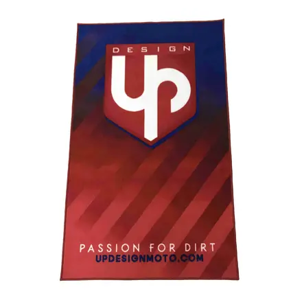 Custom logo motorcycle pit mat printed in red and blue with a shield graphic