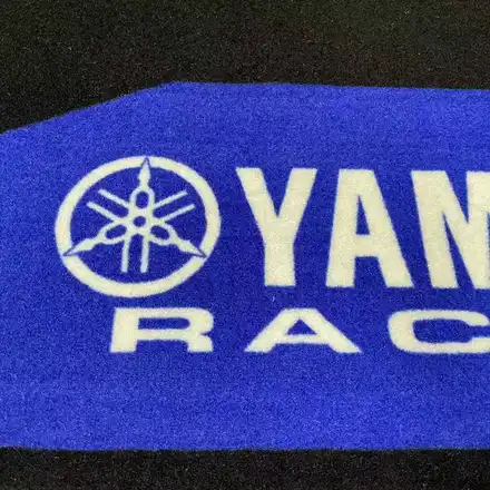 Close-up of the nylon pile surface showing printed graphic detail