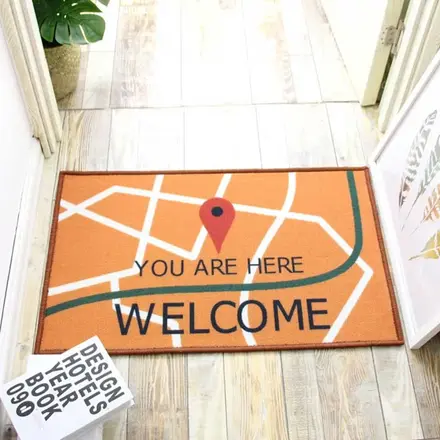 Latex backed indoor door mat with a printed surface design