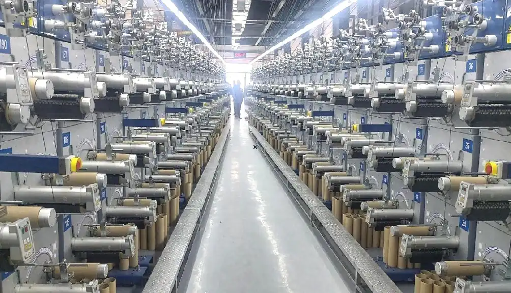 MS209A dual-head automatic turret winder installed on a production floor
