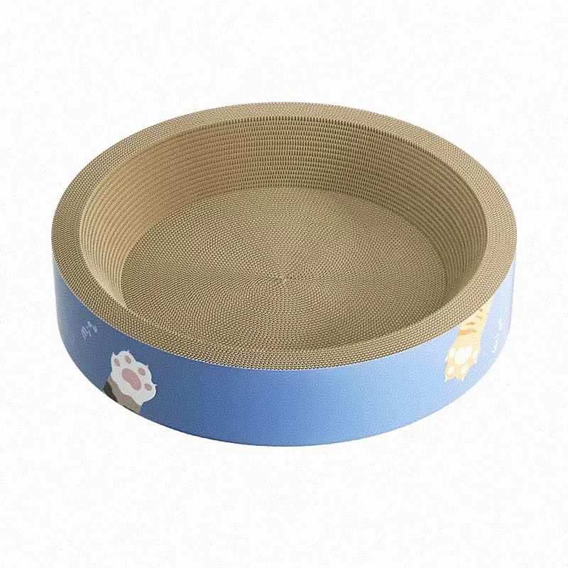 Round cardboard cat scratcher in use position on a floor