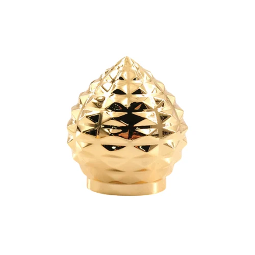 Pinecone Textured Gold Perfume Cap photographed against a white background