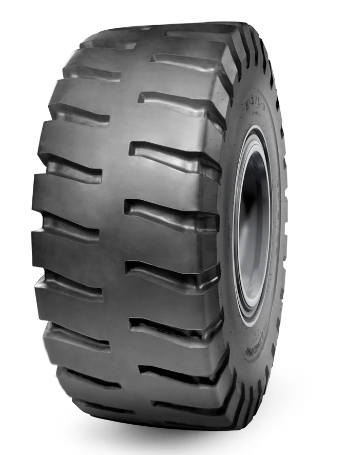 E-3/L-3 bias OTR tyre mounted on a loader wheel, showing large tread depth and wide profile