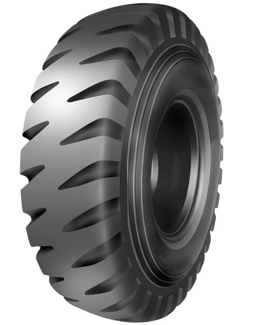 E-4 bias OTR tyre, 21.00-35, with deep tread pattern and self-cleaning design, mounted on a dump truck wheel