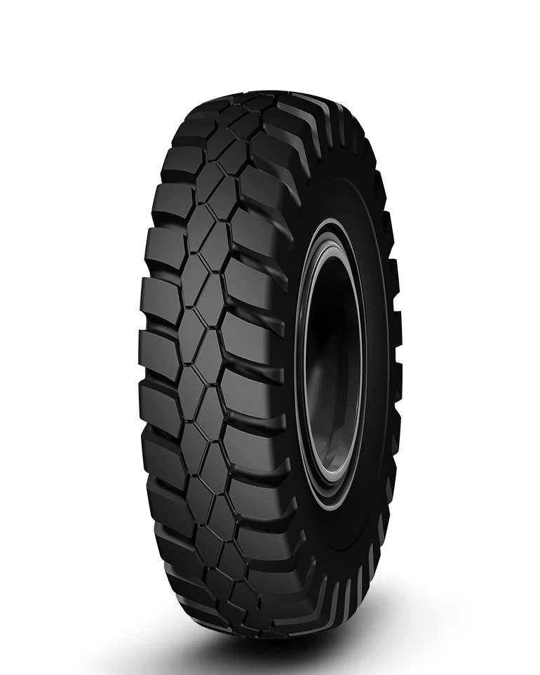 EM02(E-4)-New bias OTR tyre mounted on a large self-dumping truck wheel, showing wide tread and deep grooves for off-road performance