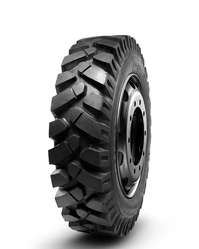 LL32 bias agricultural tyre with deep tread pattern and reinforced sidewall, shown in profile