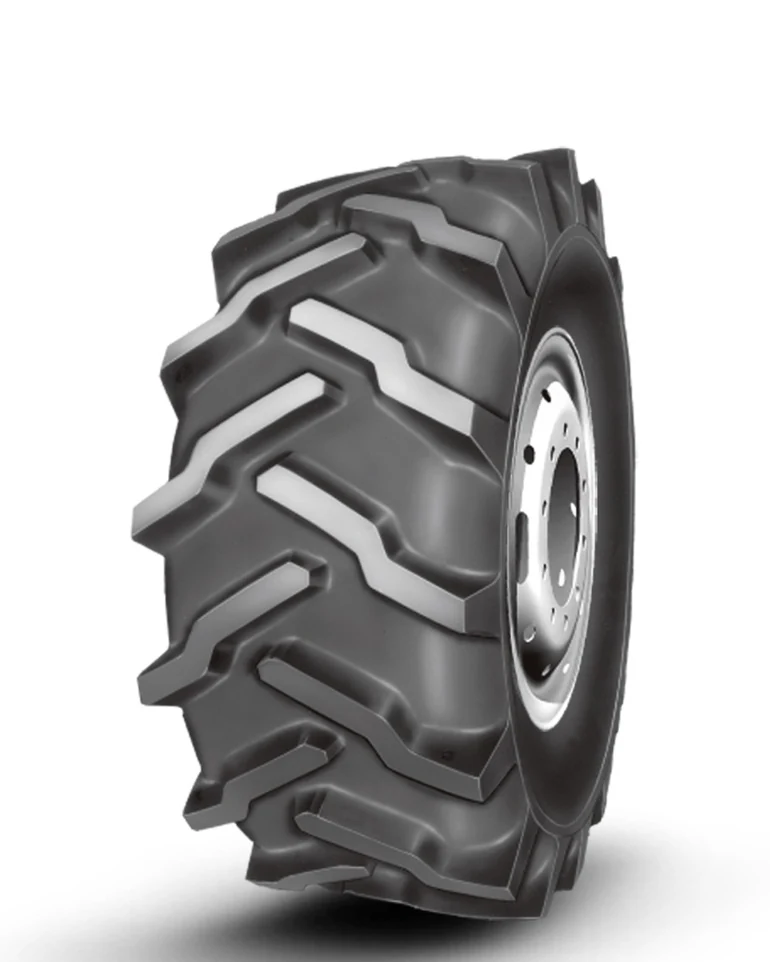 LL76 bias agricultural tyre with block tread pattern and reinforced sidewall, mounted on a DW20 rim