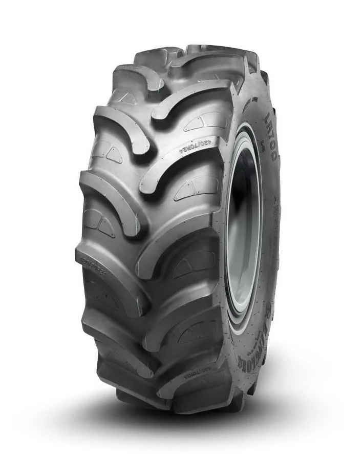 LR700 radial agricultural tyre with deep tread pattern and wide section, showing self-cleaning groove design