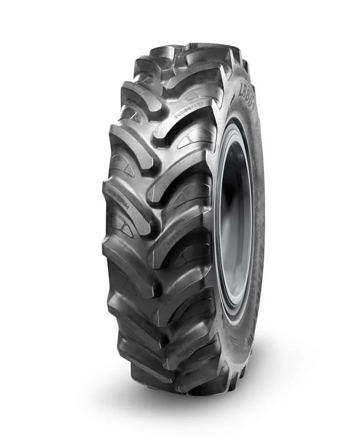 LR861 radial agricultural tyre with deep tread pattern and reinforced sidewall, mounted on a wide rim