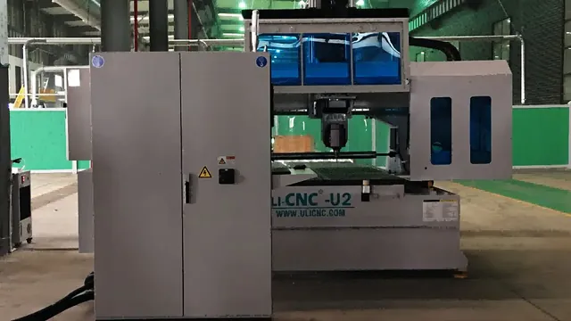 CNC machining equipment and control cabinet on the workshop floor