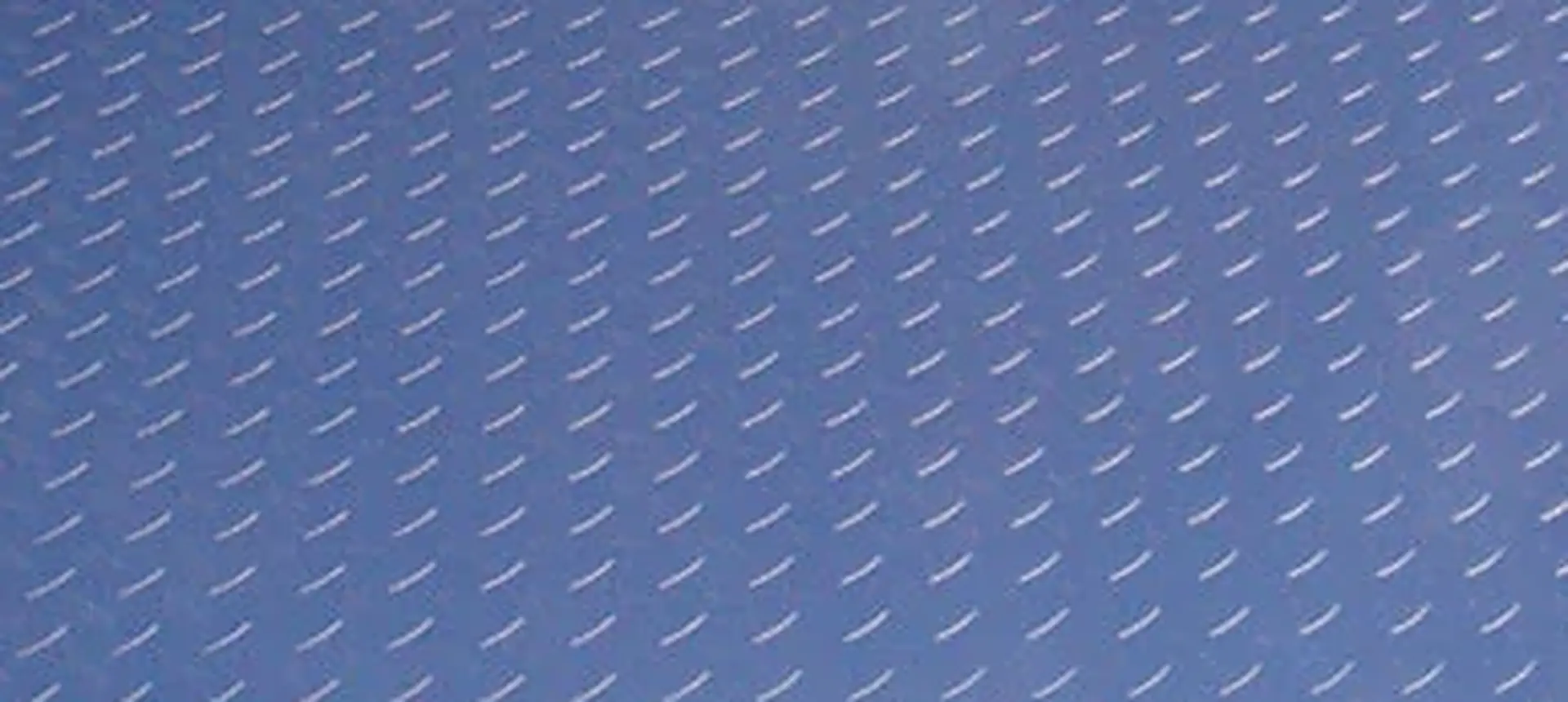 Chequer plate deck surface of an industrial floor scale