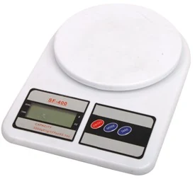 Compact digital kitchen scale with round weighing platform and LCD