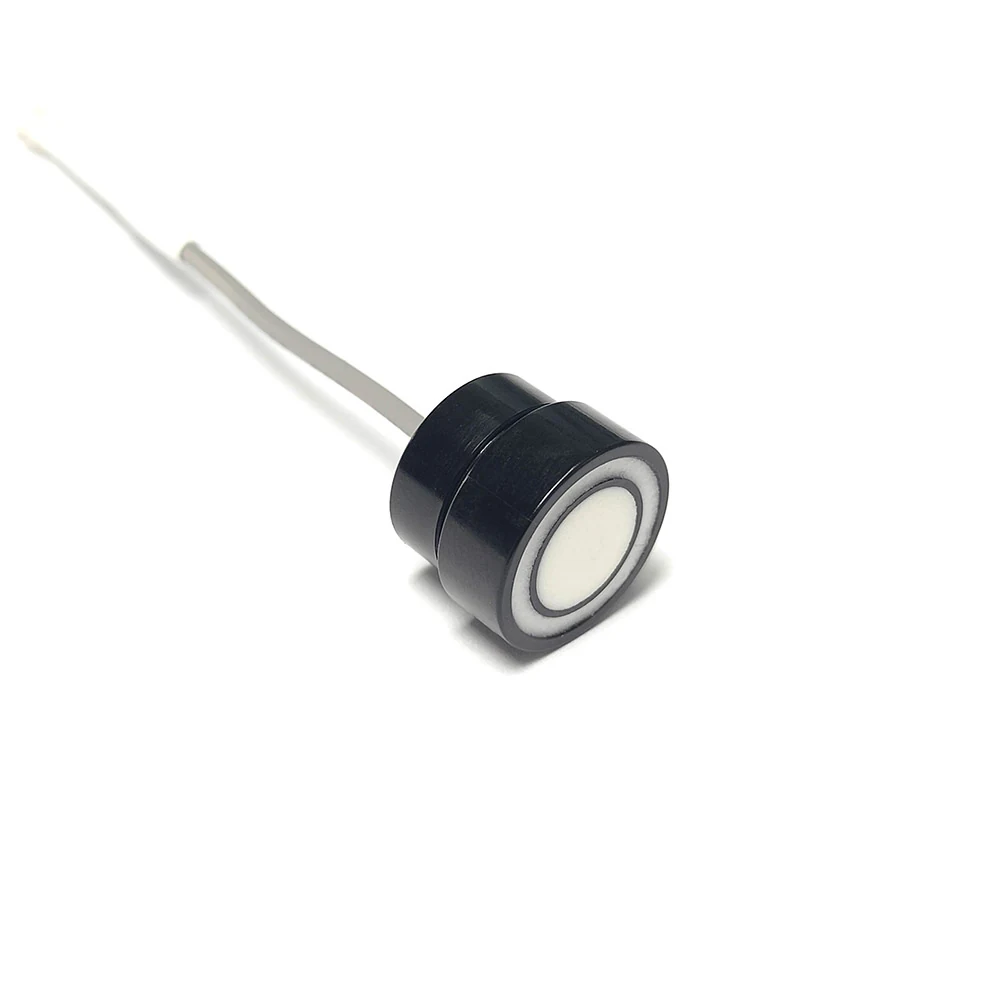 Ultrasonic Material Recognition Sensor 1 viewed from the side, showing the two-step housing and flat ribbon lead
