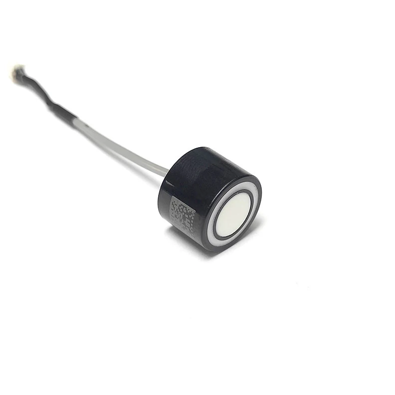 Ultrasonic Material Recognition Sensor 3, a compact black transducer with white ceramic face and fine coaxial lead with micro connector