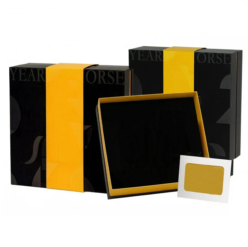 Set of black and gold rigid boxes in several formats
