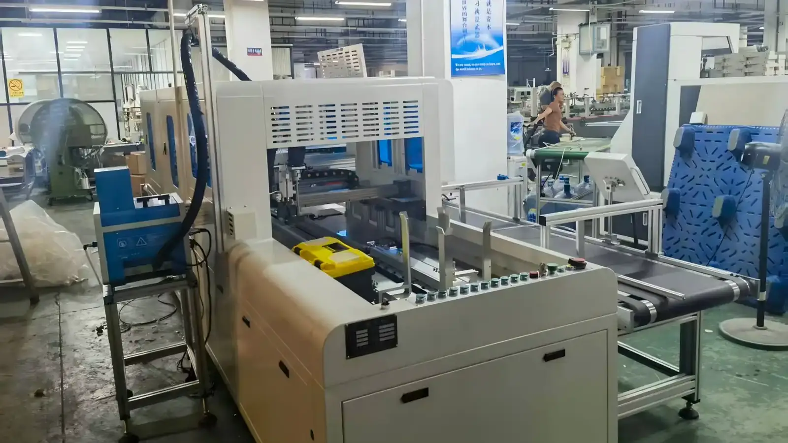 Guorun technicians assembling glue spraying units on the production floor