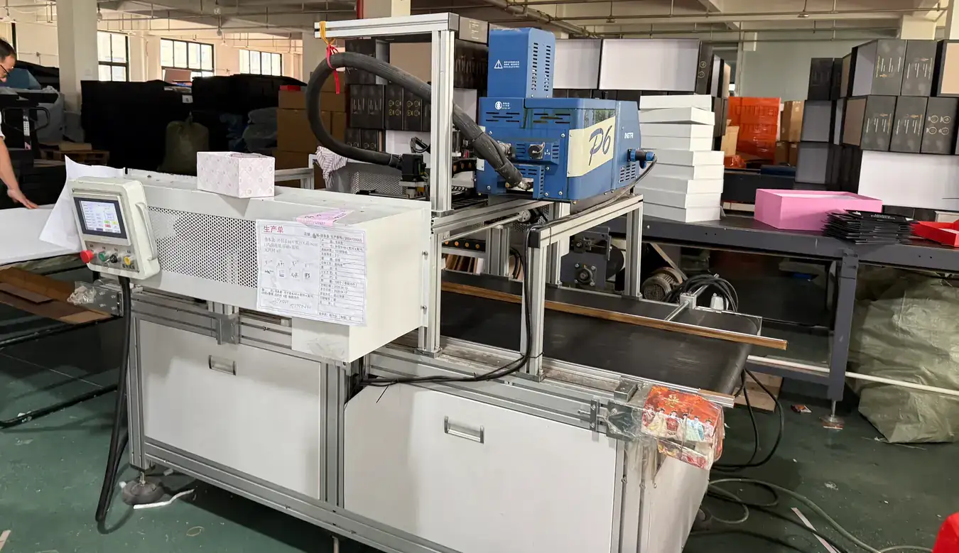 Box forming machine with touch screen control station in the Guorun workshop