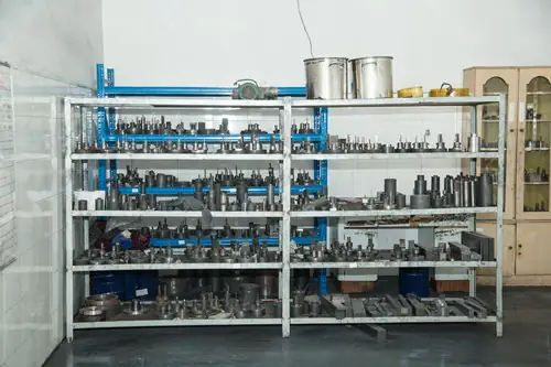 Press tooling and dies stored on the shop floor for repeat parts