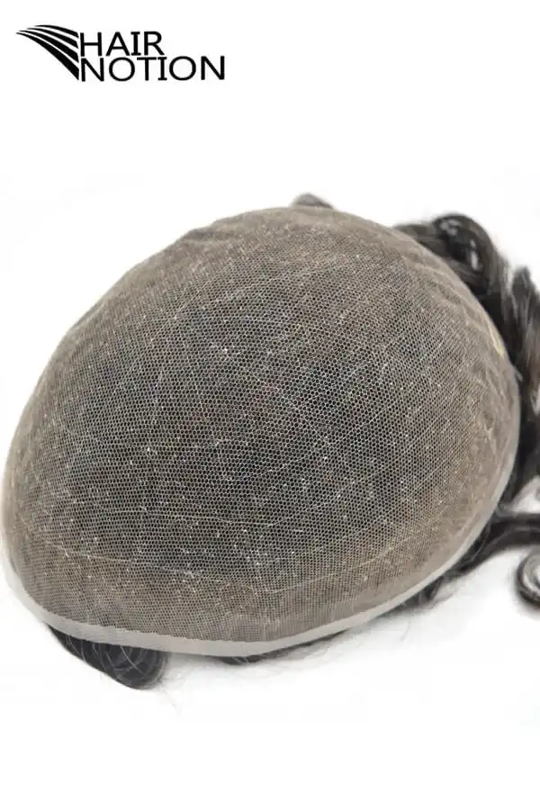 Full French lace hairpiece for men shown from above with the front hairline visible