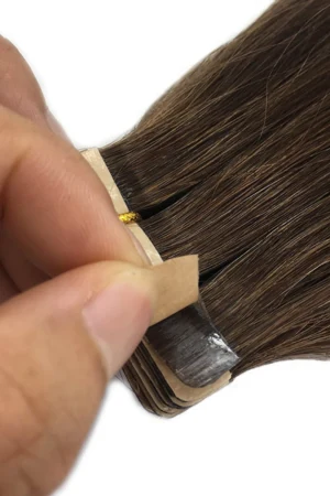 22 inch tape-in hair extensions shown laid flat with the tape section visible