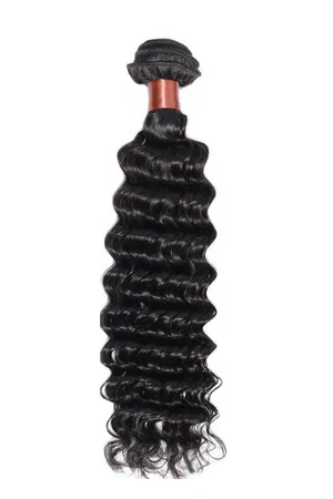 Close-up of the machine double weft construction at the edge of a hair bundle