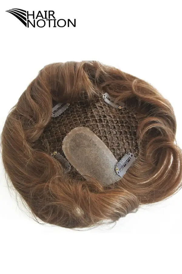 Custom fish net hair replacement toupee for men with injected skin top shown from above, highlighting the natural scalp appearance