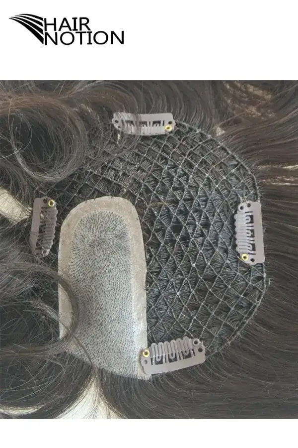 Custom fish net hair system for men with injected skin top, shown from above with the front hairline visible
