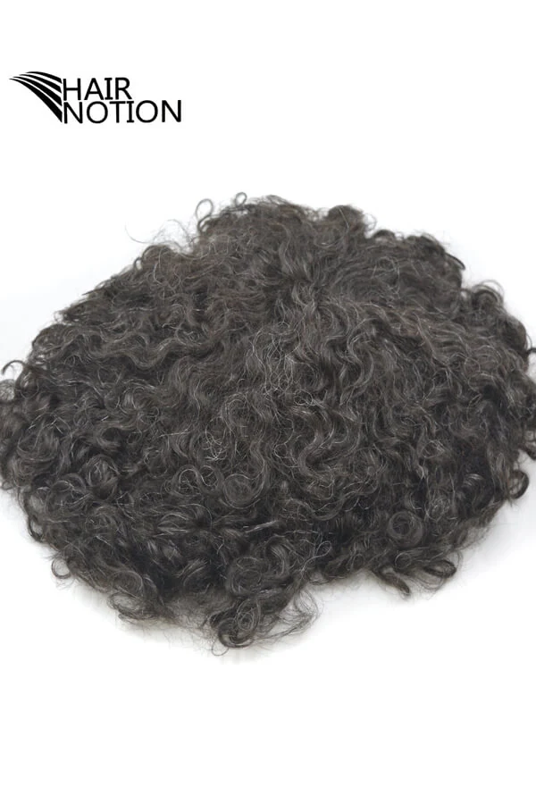 Close-up of the skin base showing the injected hairline with no visible knots