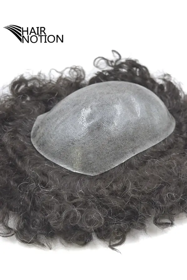 Custom men's skin hair toupee shown from above with the front hairline visible