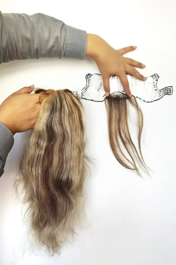 Women's frontal hair piece with clear PU front contour and mono base, shown from above with the hairline visible