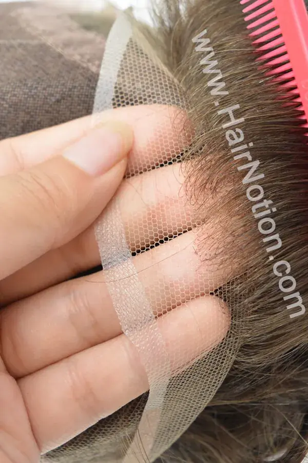 D-LW hair system styled on a mannequin head showing the front parting and natural hairline