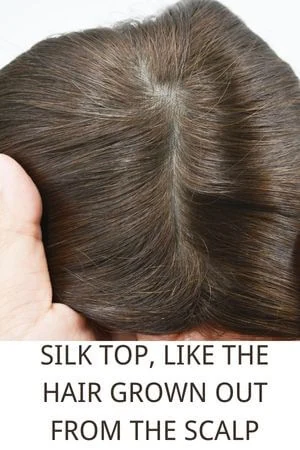Close-up of the SAURA topper on a mannequin head with the hair flowing naturally