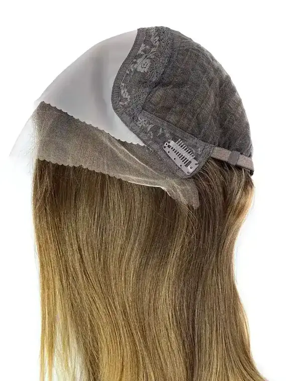 Lace top wig styled on a mannequin head showing the front parting and natural hairline